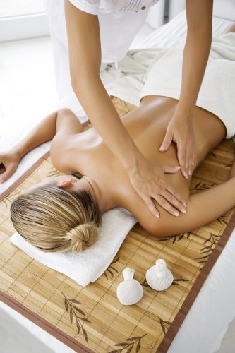 female receiving professional massage
